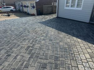 Freshly laid block paved driveway by GND Landscaping & Building in Harwich, UK, demonstrating expert driveway paving and landscaping services.