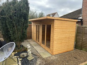 Newly erected summer house by GND Landscaping & Building in Harwich, UK, demonstrating quality garden construction and outdoor living space services.