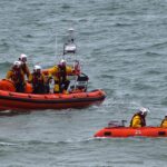 RNLI Harwich Open Day 2025 poster with lifeboats and rescue demos in harbour